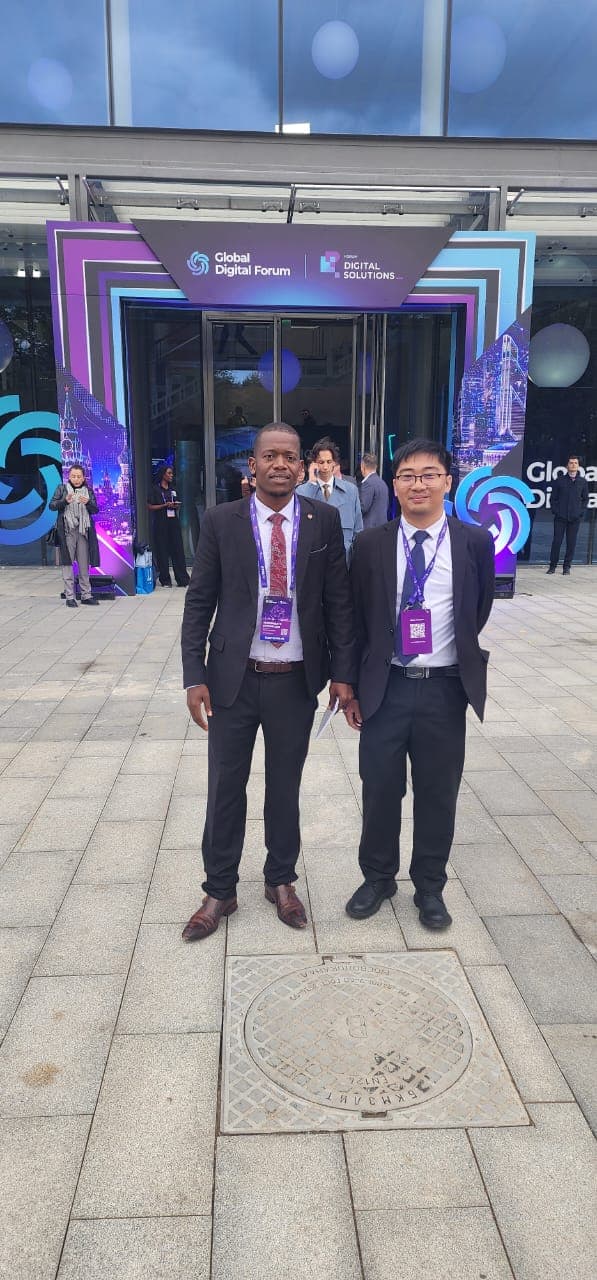 Mussollini Mugumbate with a fellow delegate outside the forum venue
